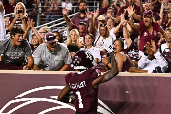 Texas A&M Aggies wide receiver Evan Stewart (1) waves to the fans after his touchdown during the third quarter New Mexico Lobos at Kyle Field.